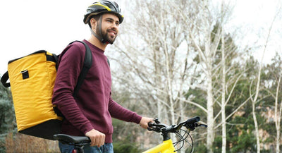 Kodėl elektriniai dviračiai yra geriausi transporto priemonės pristatymo kurjeriui?